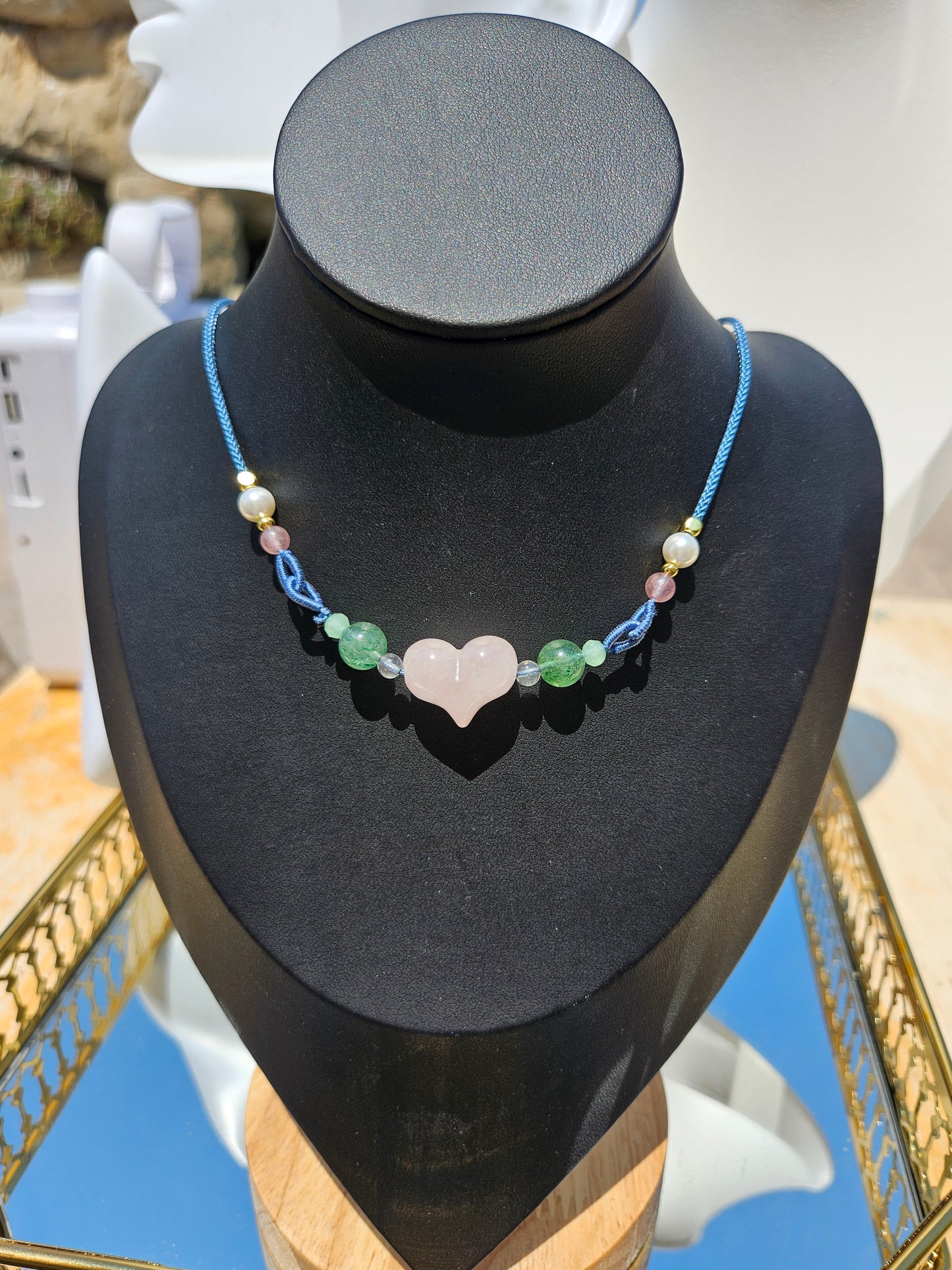 Natural rose quartz heart-shaped pendant necklace with hand-woven adjustable rope