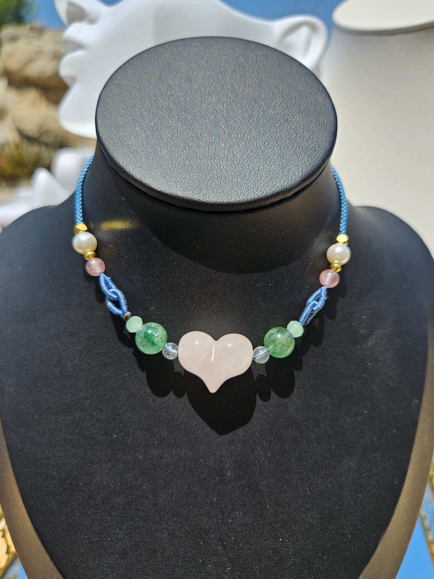 Natural rose quartz heart-shaped pendant necklace with hand-woven adjustable rope