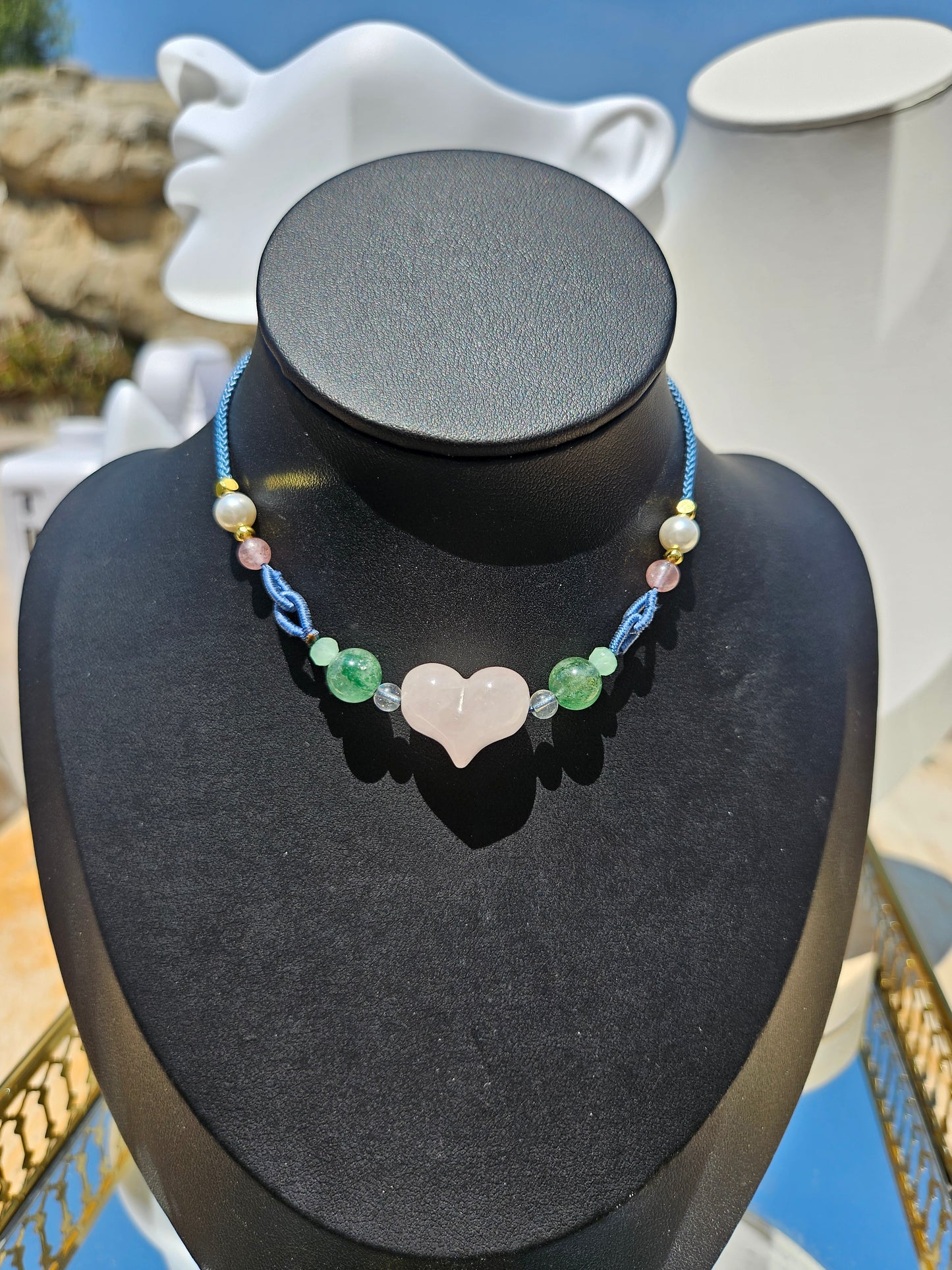 Natural rose quartz heart-shaped pendant necklace with hand-woven adjustable rope