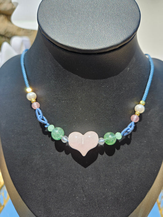 Natural rose quartz heart-shaped pendant necklace with hand-woven adjustable rope