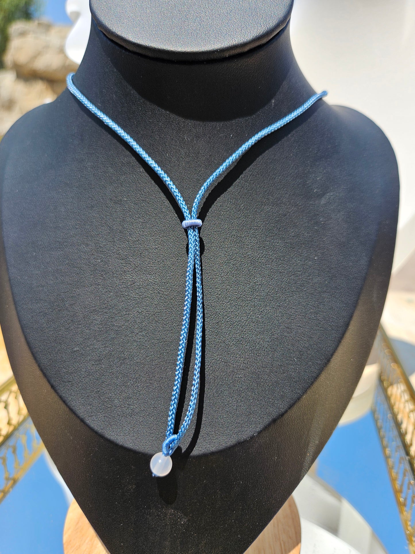 Natural rose quartz heart-shaped pendant necklace with hand-woven adjustable rope